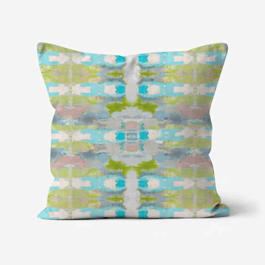 Ava Mid-Century Modern Geometric Throw Pillow with an abstract painted design in green, blue, grey, mauve, aqua, teal, and white on a linen-textured fabric.