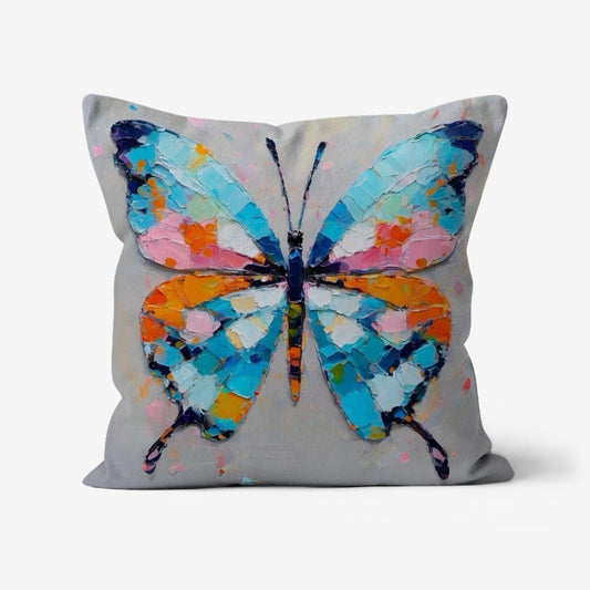 Bohemian Butterfly Blues Throw Pillow with a colorful impasto-style abstract design resembling butterfly wings in blue, teal, and white on a linen-look fabric.