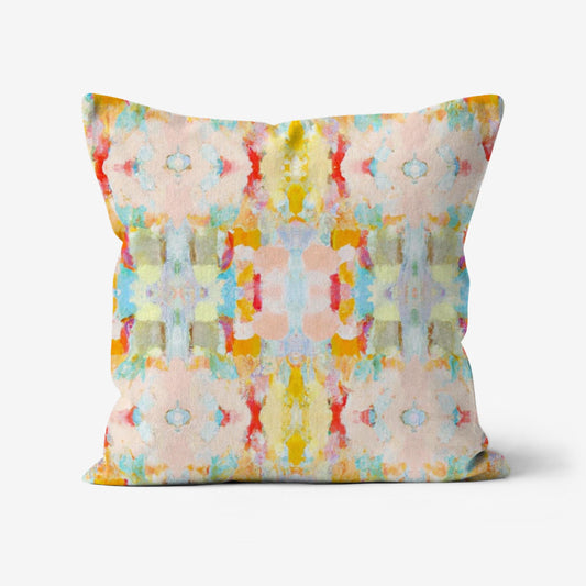 Cora Mid-Century Modern Geometric Throw Pillow featuring an abstract painted print in yellow, beige, green, blue, orange, and red with a linen-textured fabric.