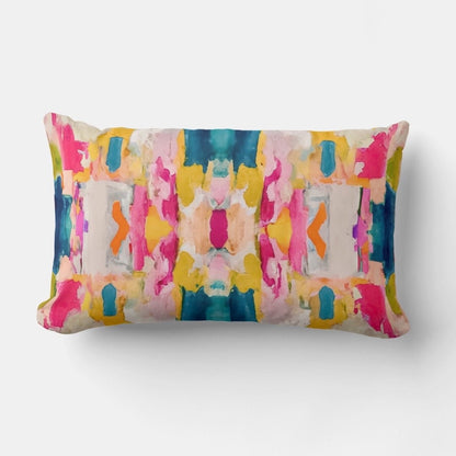 Eva Boho Lumbar Throw Pillow featuring an abstract painted design in blue, pink, yellow, green, orange, beige, and grey, with a soft linen-look fabric and hidden zipper.