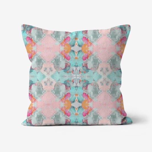 Mila Abstract Art Throw Pillow featuring a colorful hand-painted-inspired design in aqua, pale pink, hot pink, seafoam green, blue, orange, and turquoise with a linen-textured fabric.