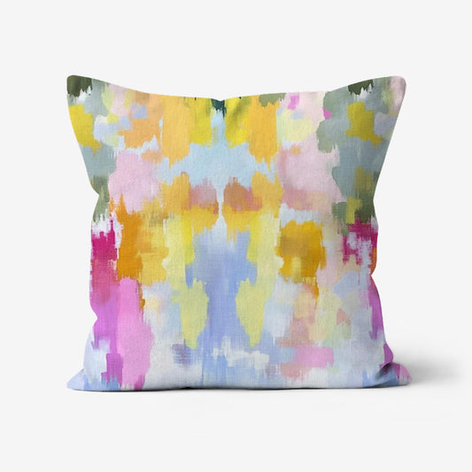 Sophia Boho Throw Pillow featuring an abstract paint print with blue, silver, purple, green, pink, fuchsia, gold, and yellow on a linen-textured fabric